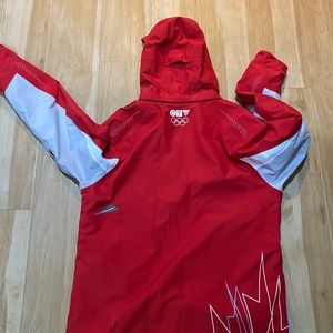 Sun Ice large insulated winter/rain coat. 2010 Olympics. Warmer than rain coat.